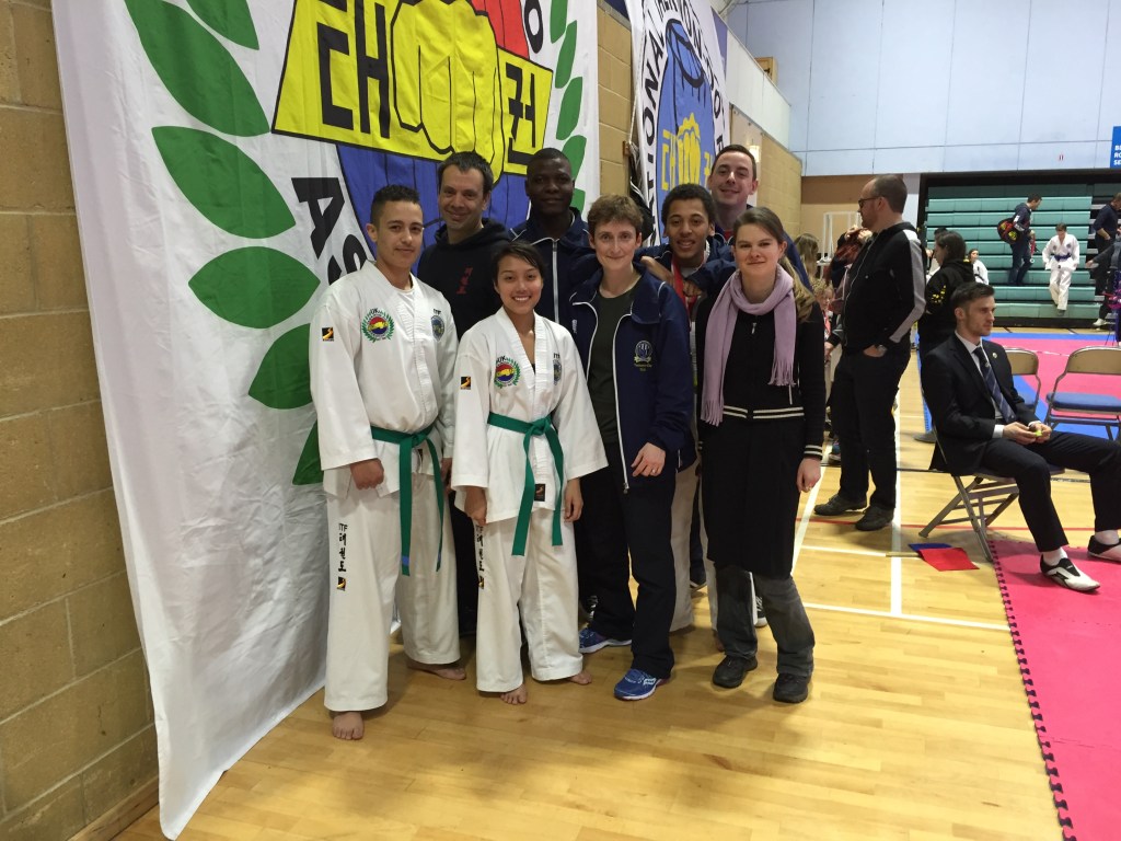Group photograph of university students, some wearing Dobok. Taken at the UKTA Open championships